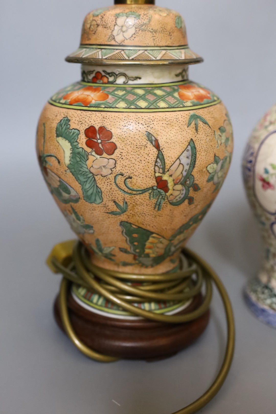 An 18th century Chinese Canton (Guangzhou) enamel vessel and a porcelain table lamp (2)